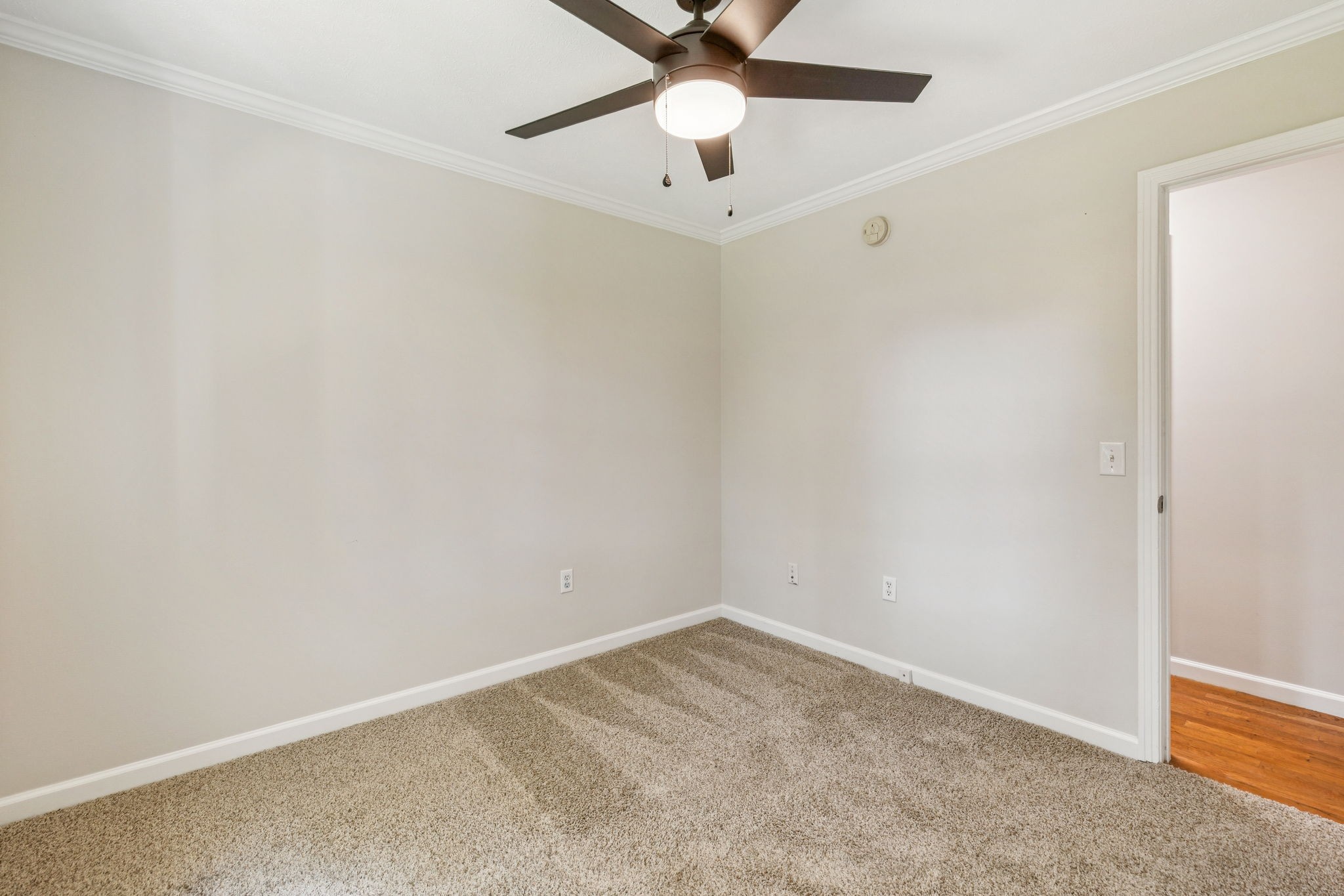 2585 Pow Road Baxter, TN 38544 - Photo 27 of 83 an empty room with a ceiling fan and a window