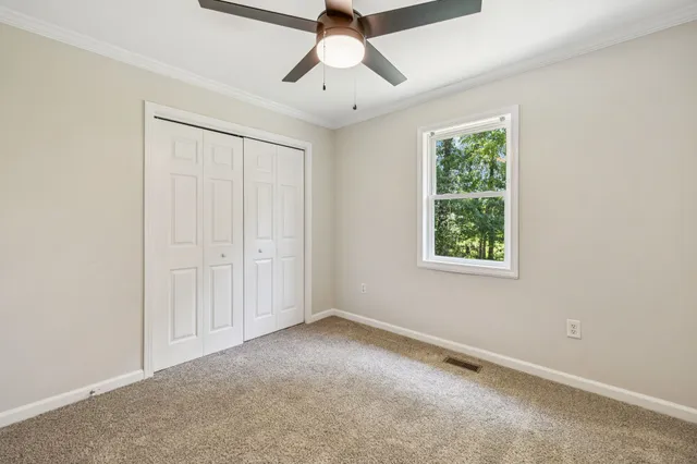 a view of a room with an empty space