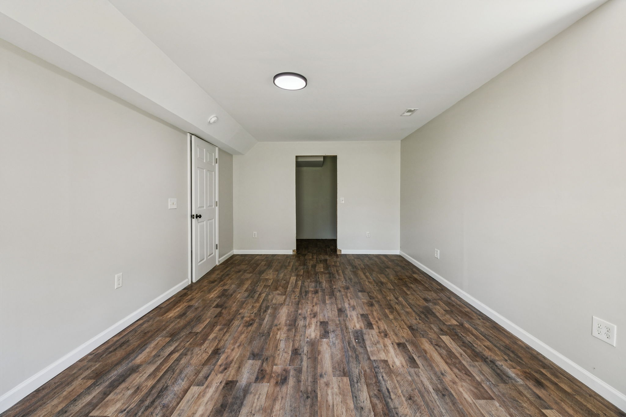 2585 Pow Road Baxter, TN 38544 - Photo 54 of 83 a view of an empty room with wooden floor and closet