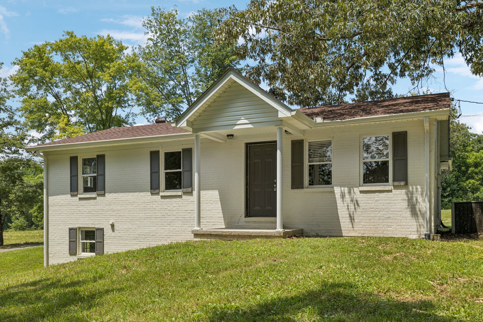 2585 Pow Road Baxter, TN 38544 - Photo 65 of 83 front view of house with a yard