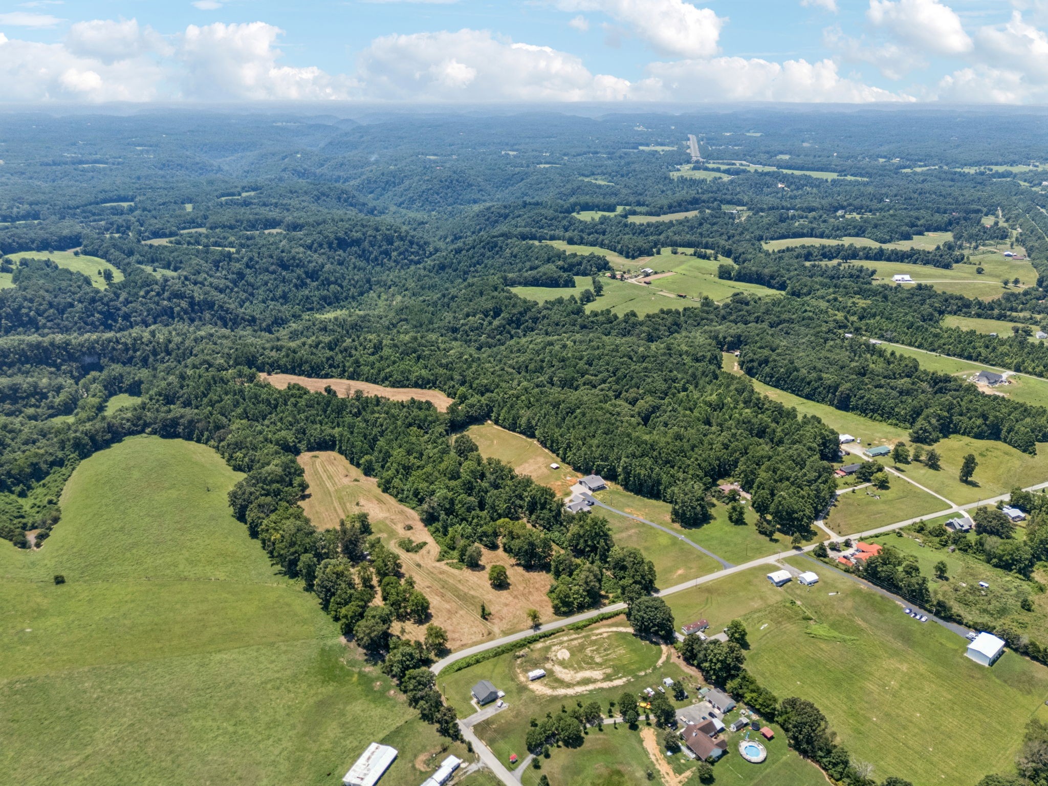 2585 Pow Road Baxter, TN 38544 - Photo 69 of 83 an aerial view of a house with a yard