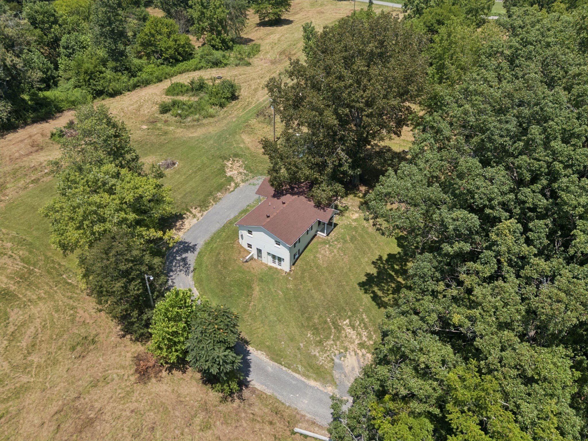 2585 Pow Road Baxter, TN 38544 - Photo 80 of 83 an aerial view of residential house with outdoor space and trees all around