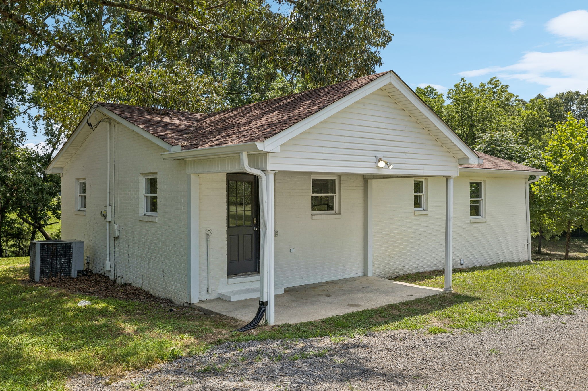 2585 Pow Road Baxter, TN 38544 - Photo 8 of 83 a view of a house with a yard and garage