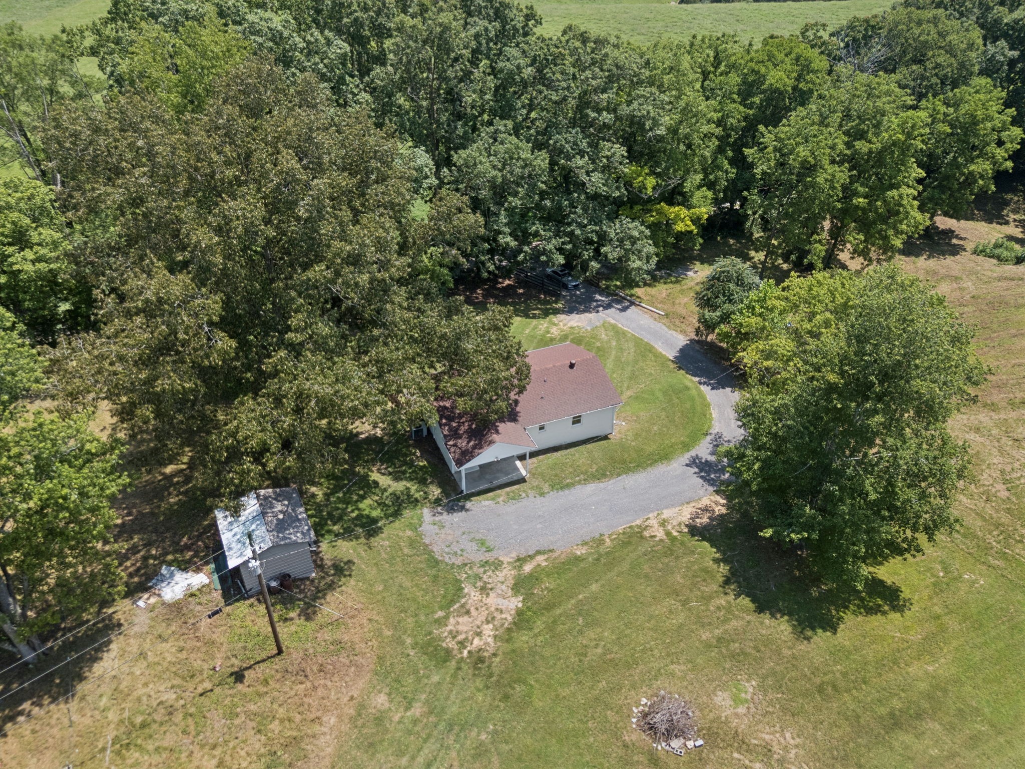 2585 Pow Road Baxter, TN 38544 - Photo 81 of 83 an aerial view of a house with a yard