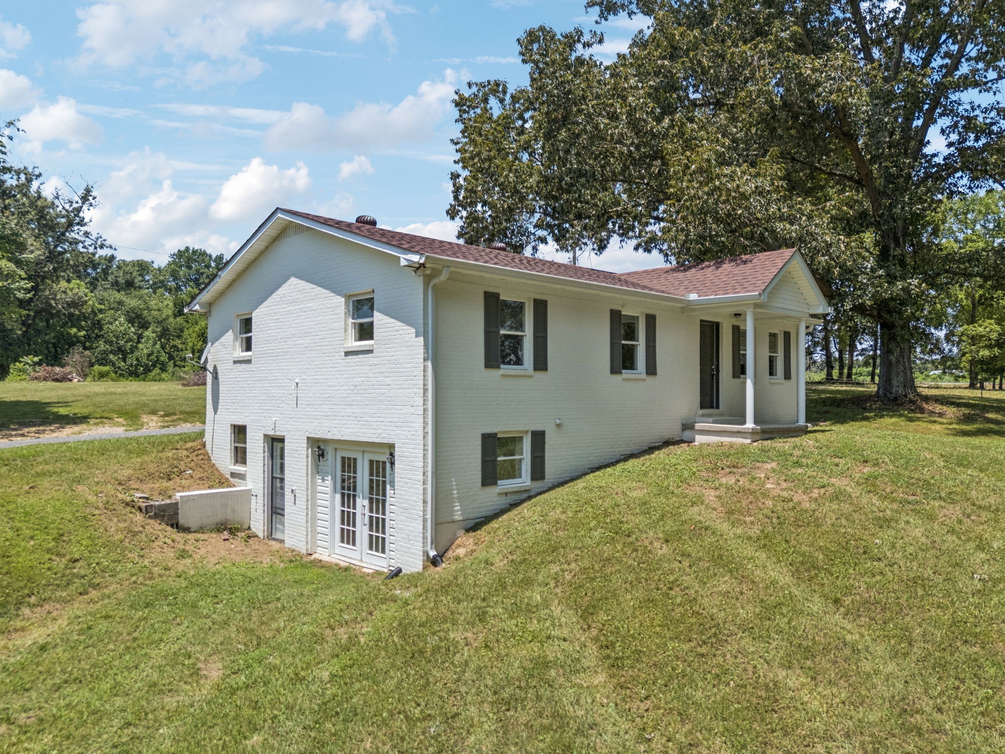 2585 Pow Road Baxter, TN 38544 - Photo 83 of 83 a view of a house with a yard and large tree