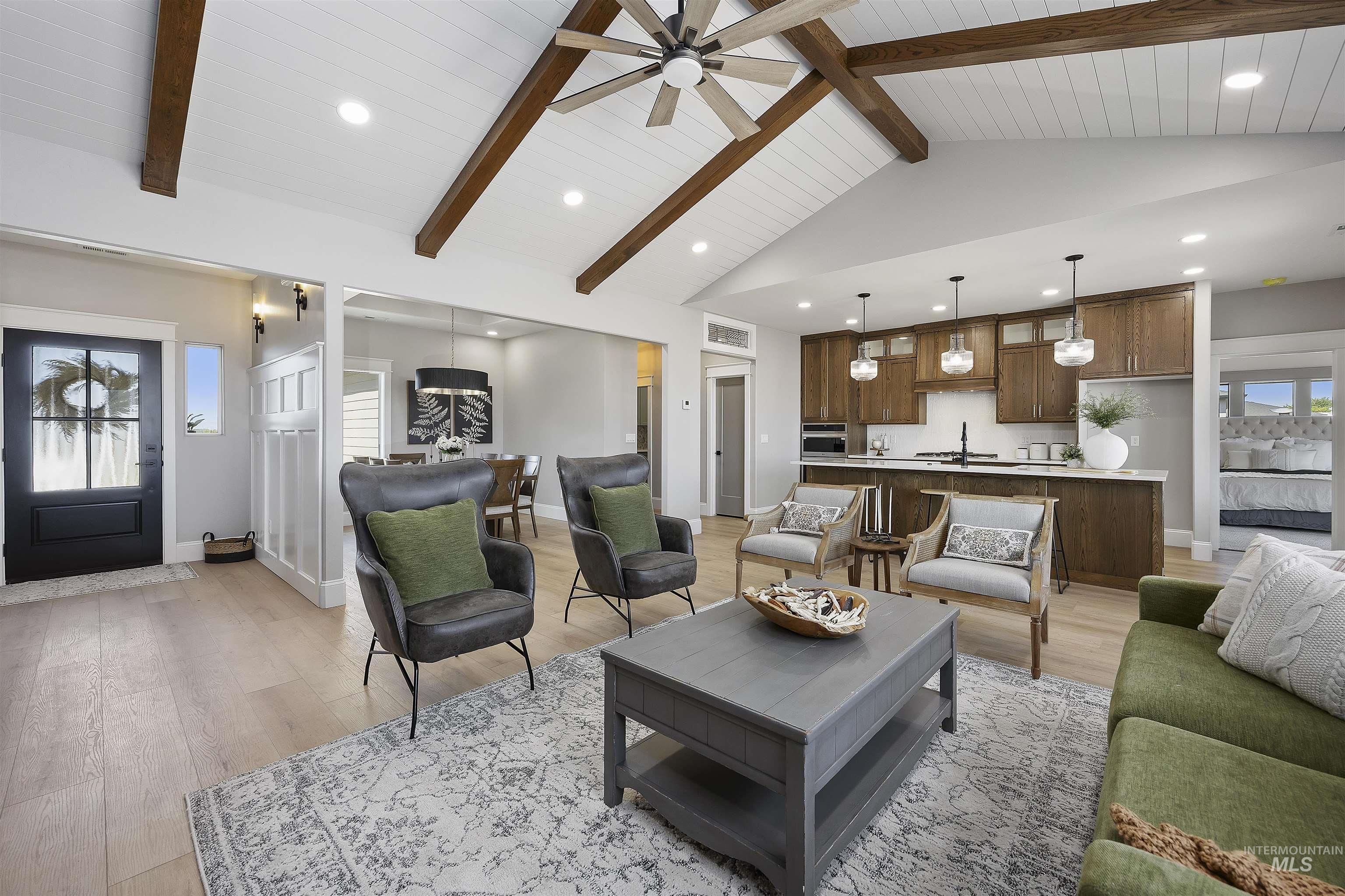 378 West 100 South Rupert, ID 83350 - Photo 7 of 50 Vaulted ceiling with exposed wood beams and wood-finish flooring