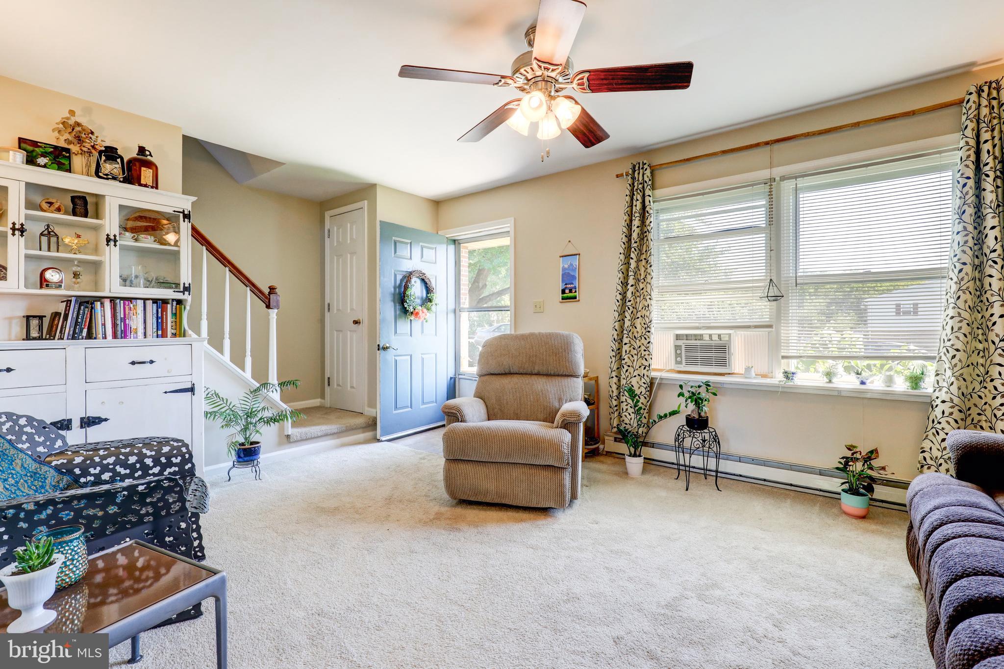 222 Miller Road Akron, PA 17501 - Photo 12 of 31 a living room with furniture and a large window