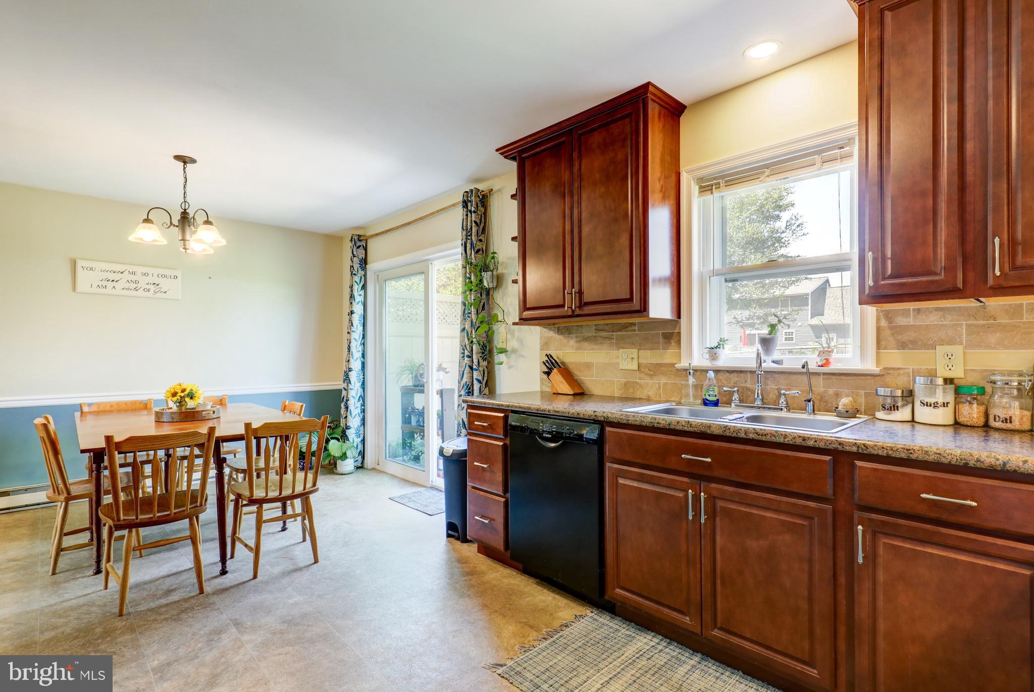 222 Miller Road Akron, PA 17501 - Photo 19 of 31 a kitchen with lots of counter top space and dining table