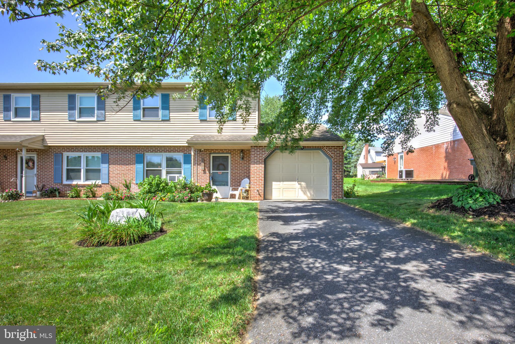 222 Miller Road Akron, PA 17501 - Photo 2 of 31 front view of a house with a yard