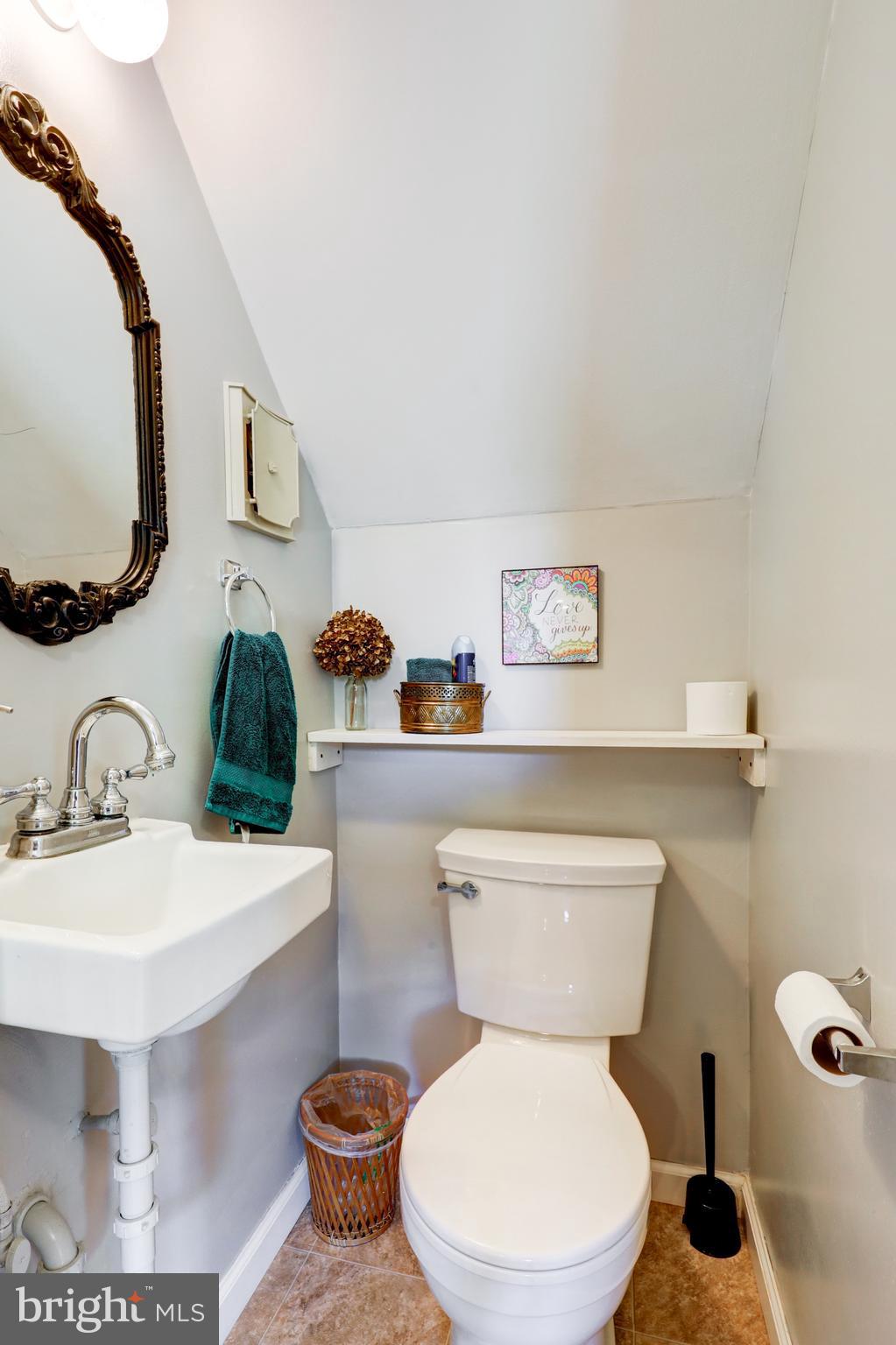 222 Miller Road Akron, PA 17501 - Photo 21 of 31 a white toilet sitting next to a bathroom sink