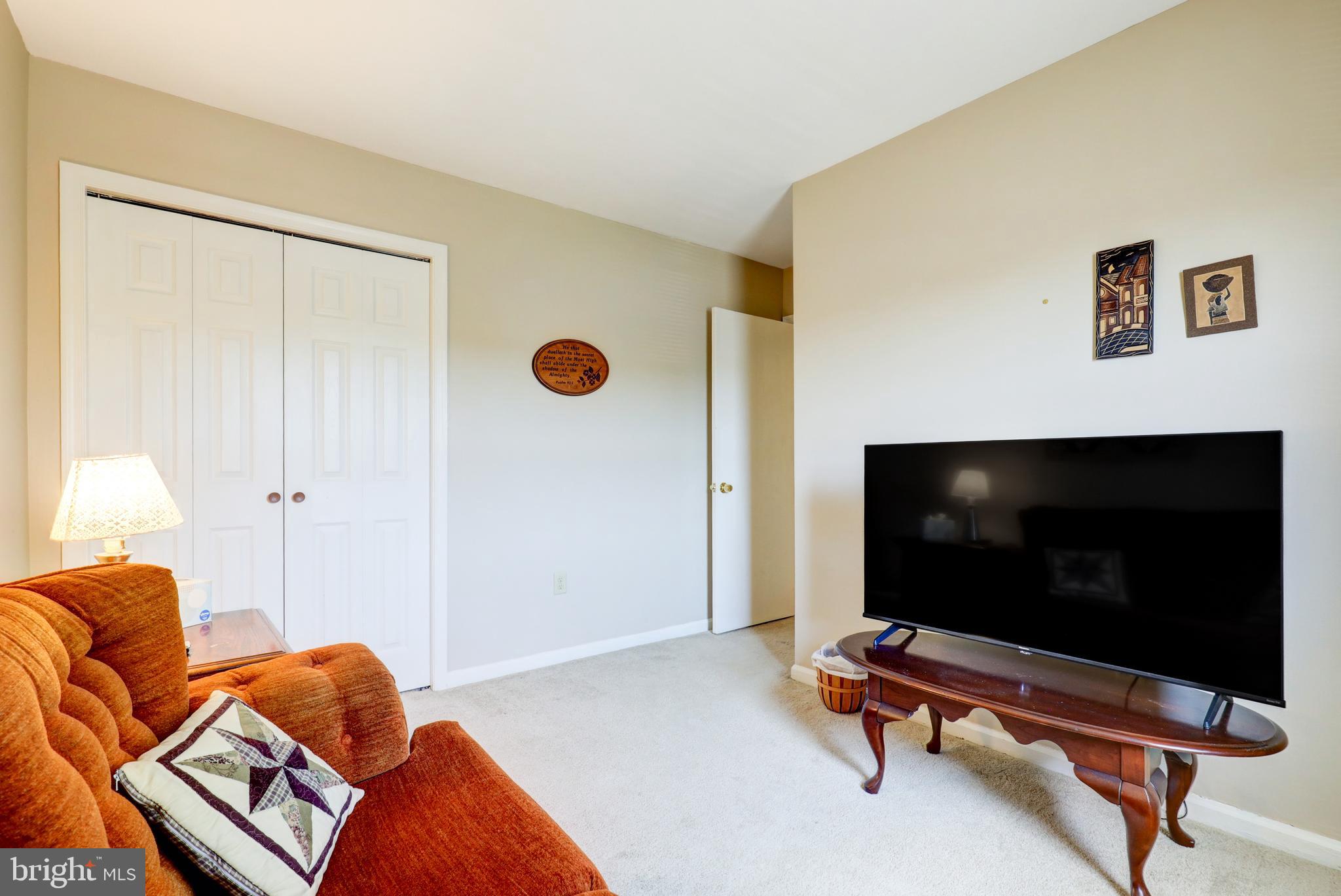 222 Miller Road Akron, PA 17501 - Photo 27 of 31 a living room with furniture and a flat screen tv
