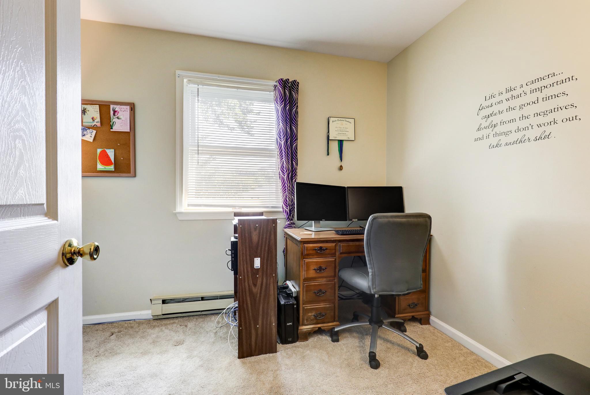 222 Miller Road Akron, PA 17501 - Photo 28 of 31 a view of a workspace with furniture and a window