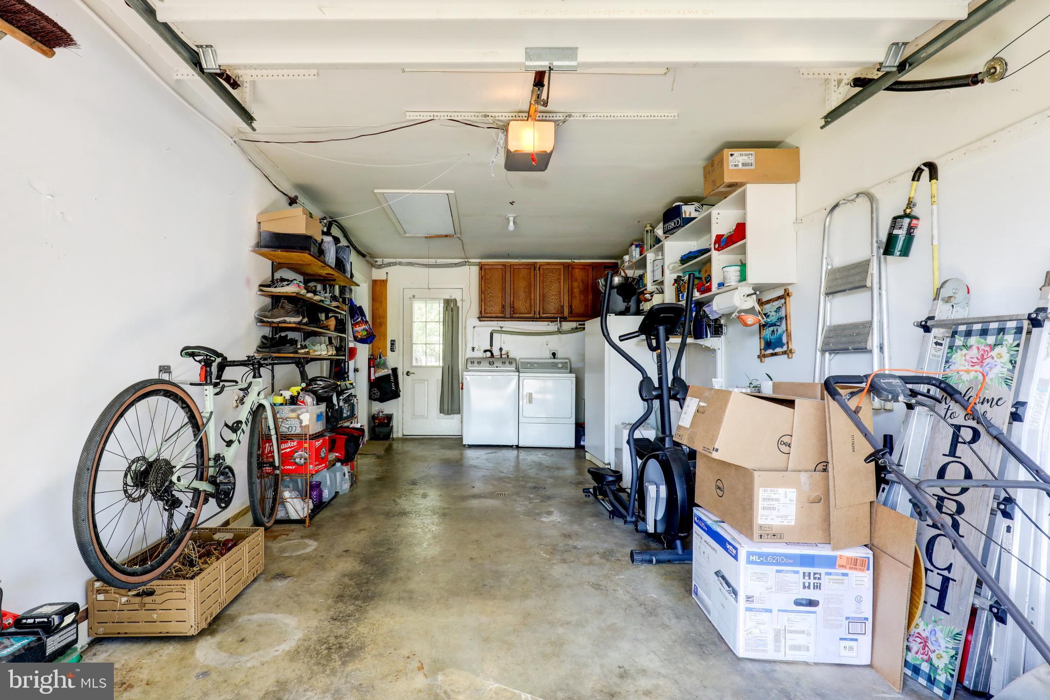 222 Miller Road Akron, PA 17501 - Photo 31 of 31 a view of a storage room with washer and dryer