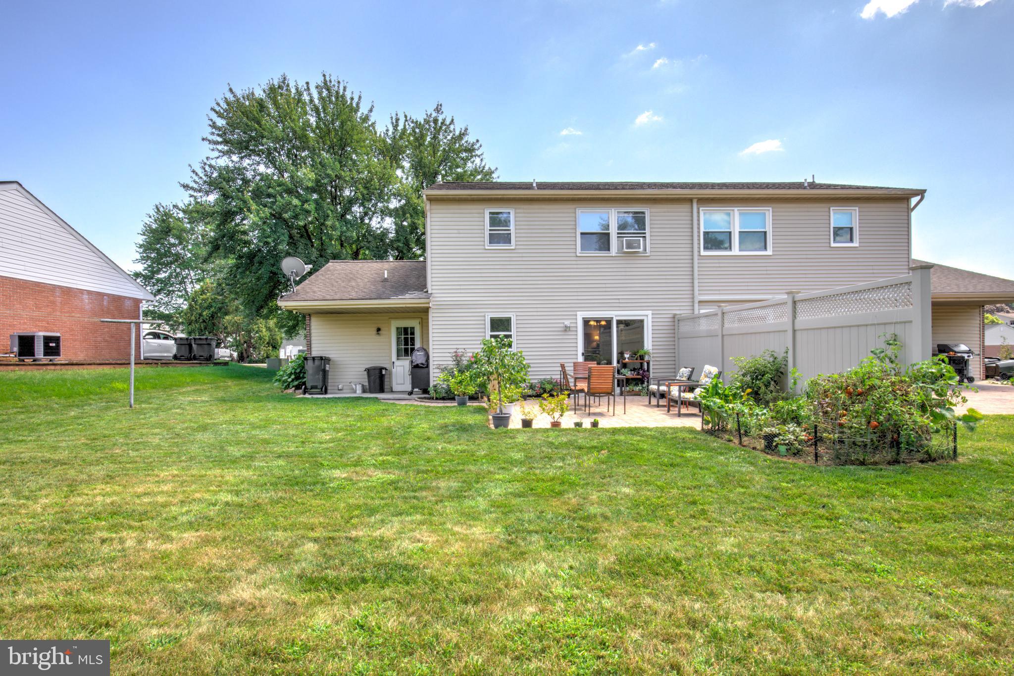 222 Miller Road Akron, PA 17501 - Photo 10 of 31 a front view of house with yard and seating area