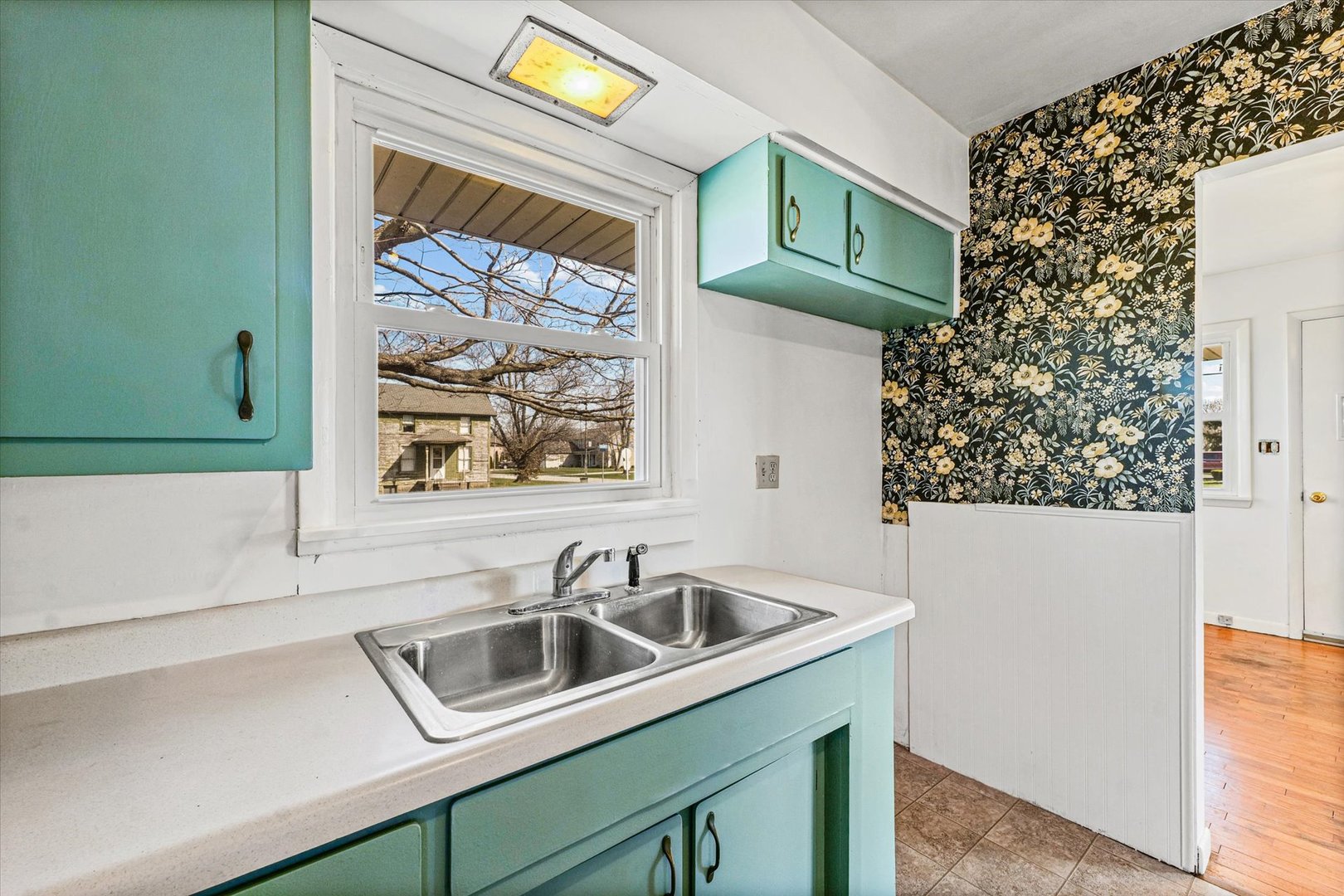 404 South Maple Street Gilman, IL 60938 - Photo 14 of 28 a bathroom with a sink and a mirror