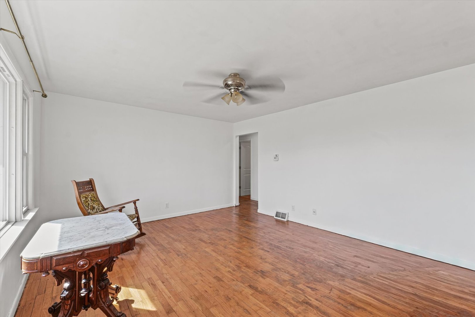 404 South Maple Street Gilman, IL 60938 - Photo 7 of 28 a view of a workspace with wooden floor