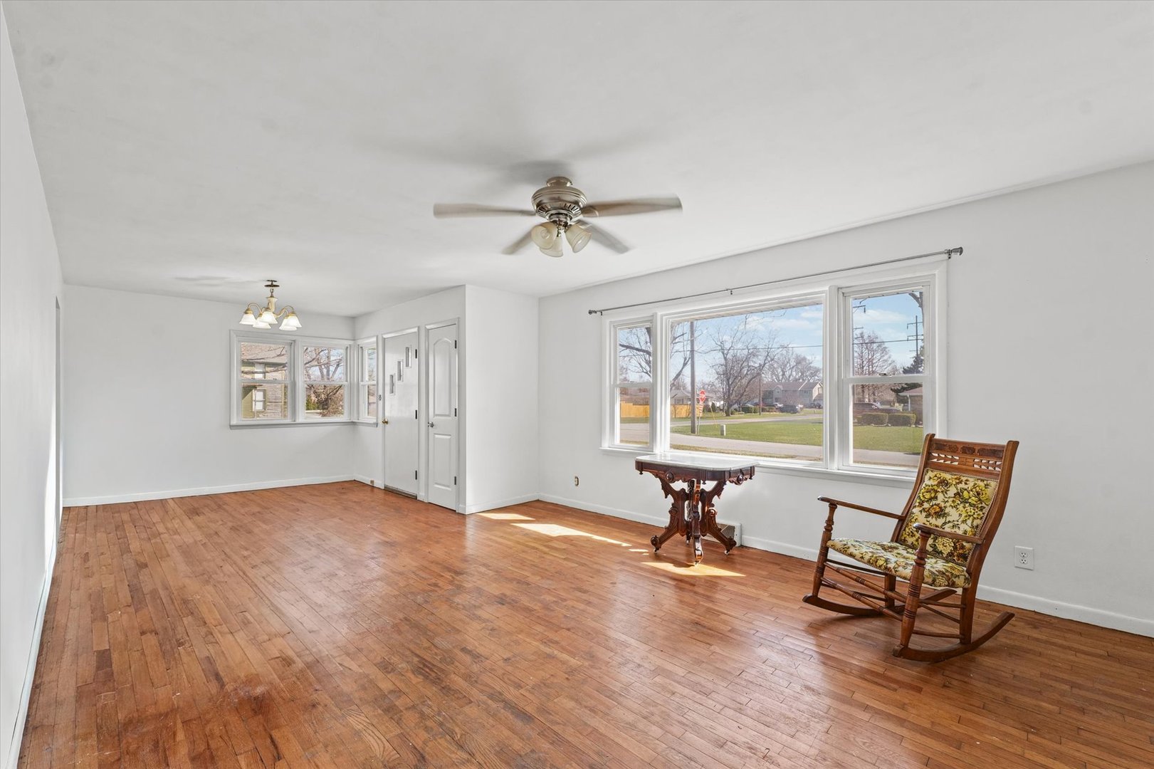 404 South Maple Street Gilman, IL 60938 - Photo 9 of 28 a view of a livingroom with furniture and wooden floor