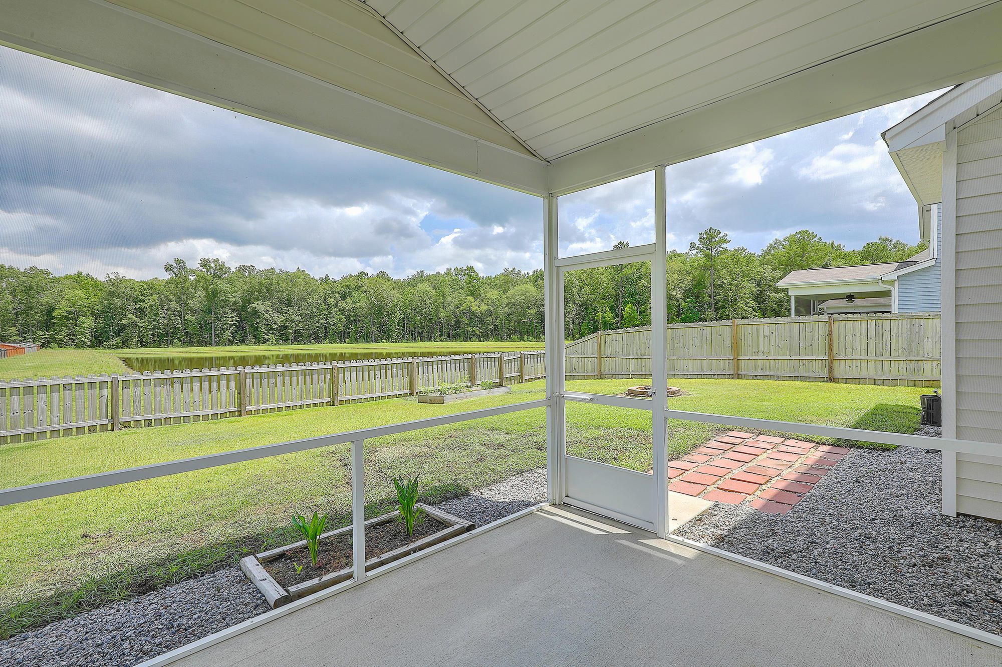 314 Knawl Road Moncks Corner, SC 29461 - Photo 31 of 35 Screened porch