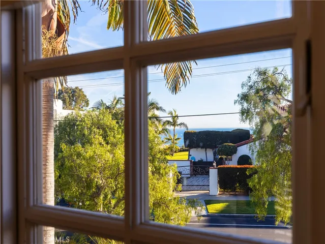 a view of swimming pool from a window