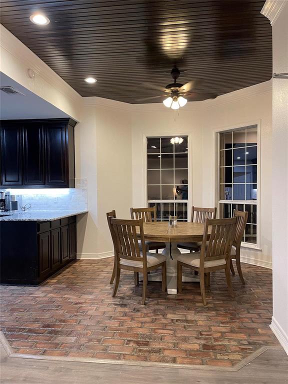 865 Higgins Road Sherman, TX 75092 - Photo 15 of 40 a view of a dining room with furniture