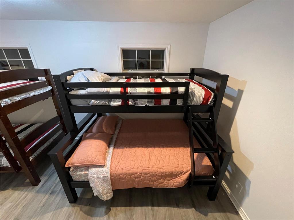 865 Higgins Road Sherman, TX 75092 - Photo 34 of 40 a view of bedroom with furniture and window