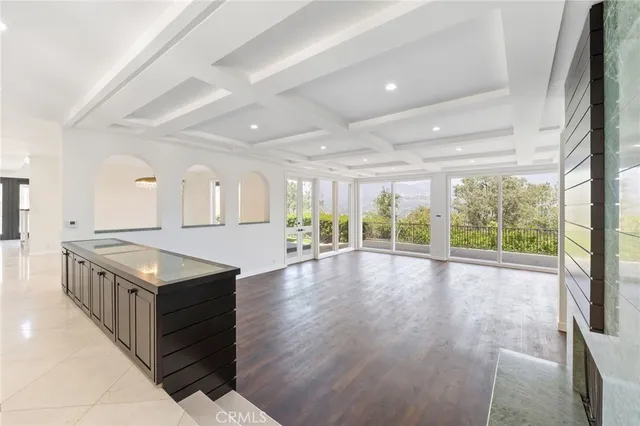 a kitchen with sink stove and cabinets