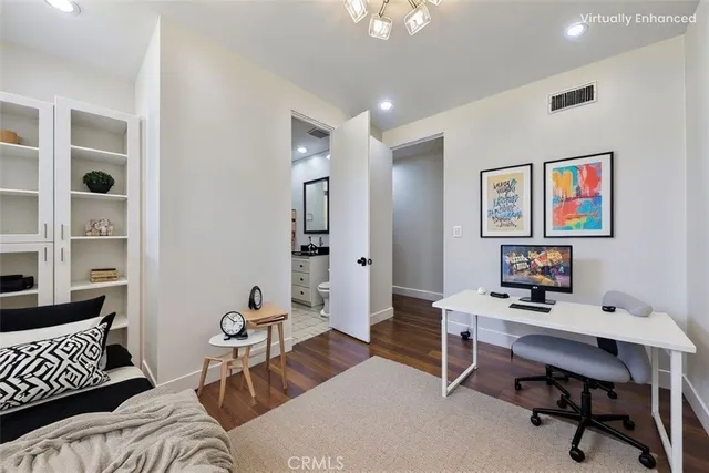 a workspace with furniture and window