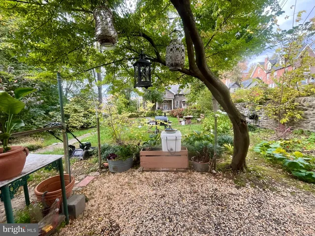 a garden view with a seating space