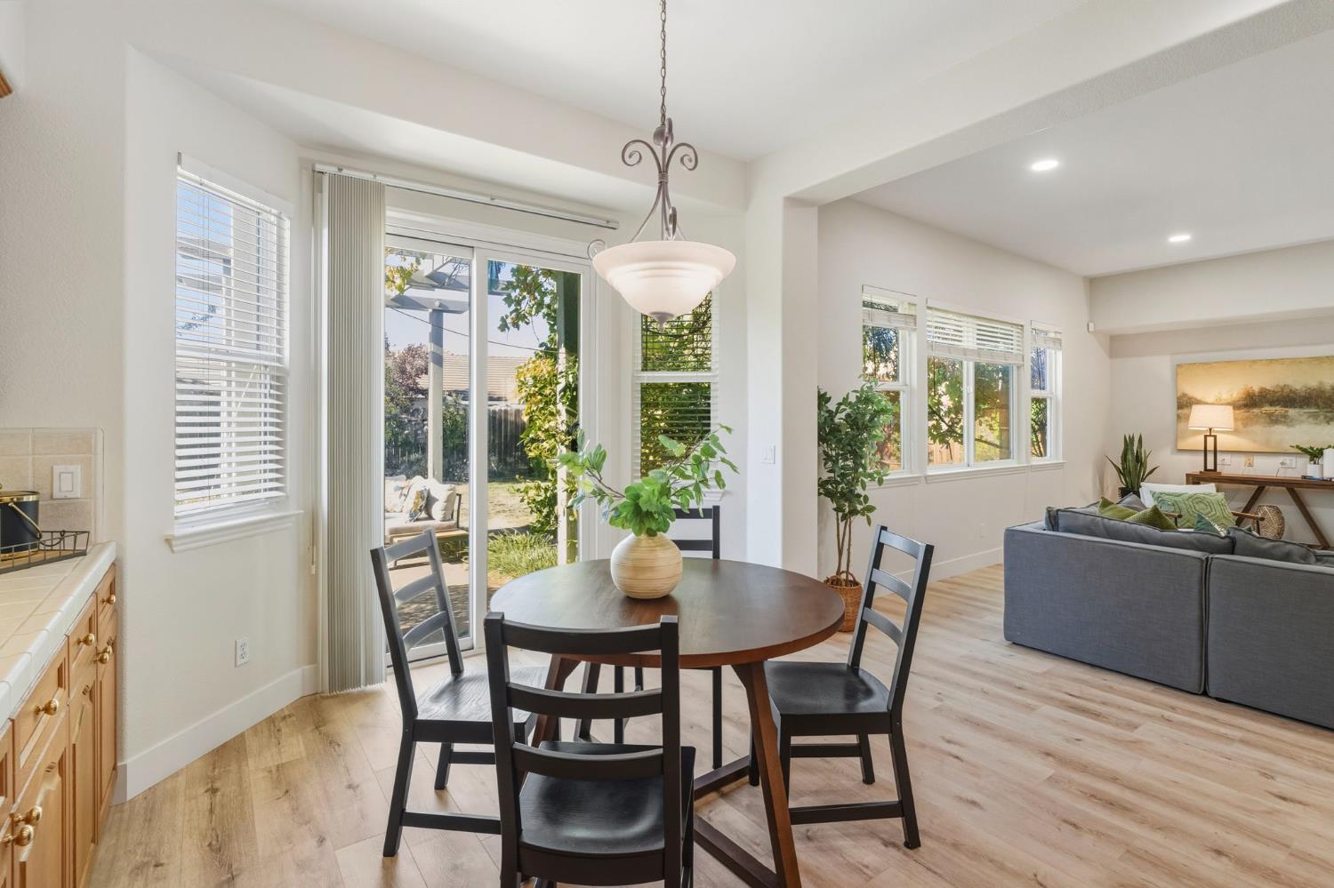3412 Muscat Way Rancho Cordova, CA 95670 - Photo 18 of 33 a dining room with furniture window wooden floor