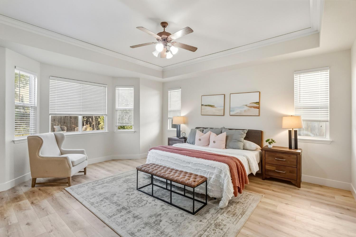 3412 Muscat Way Rancho Cordova, CA 95670 - Photo 19 of 33 a spacious bedroom with a bed chairs and window