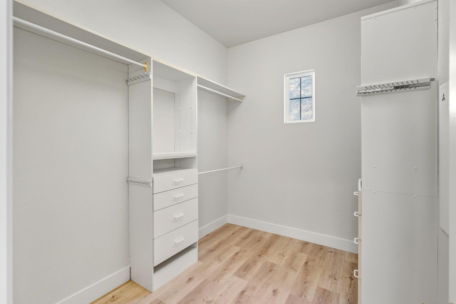 3412 Muscat Way Rancho Cordova, CA 95670 - Photo 23 of 33 a view of walk in closet with empty racks