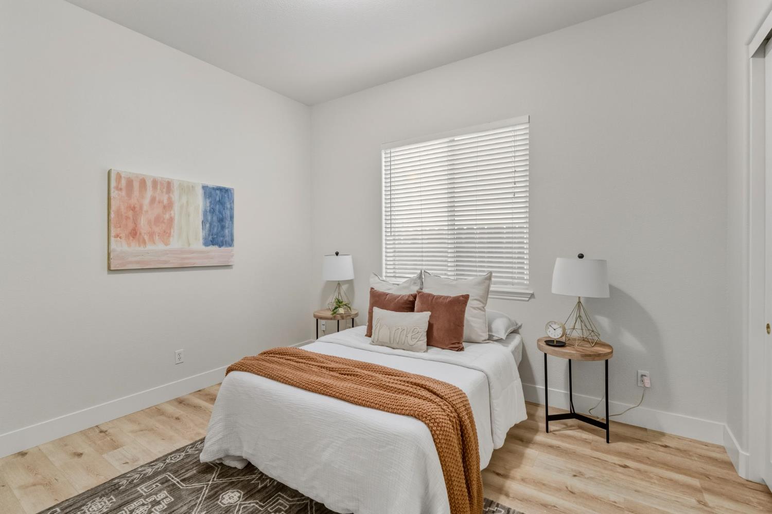 3412 Muscat Way Rancho Cordova, CA 95670 - Photo 24 of 33 a bedroom with a bed and a window