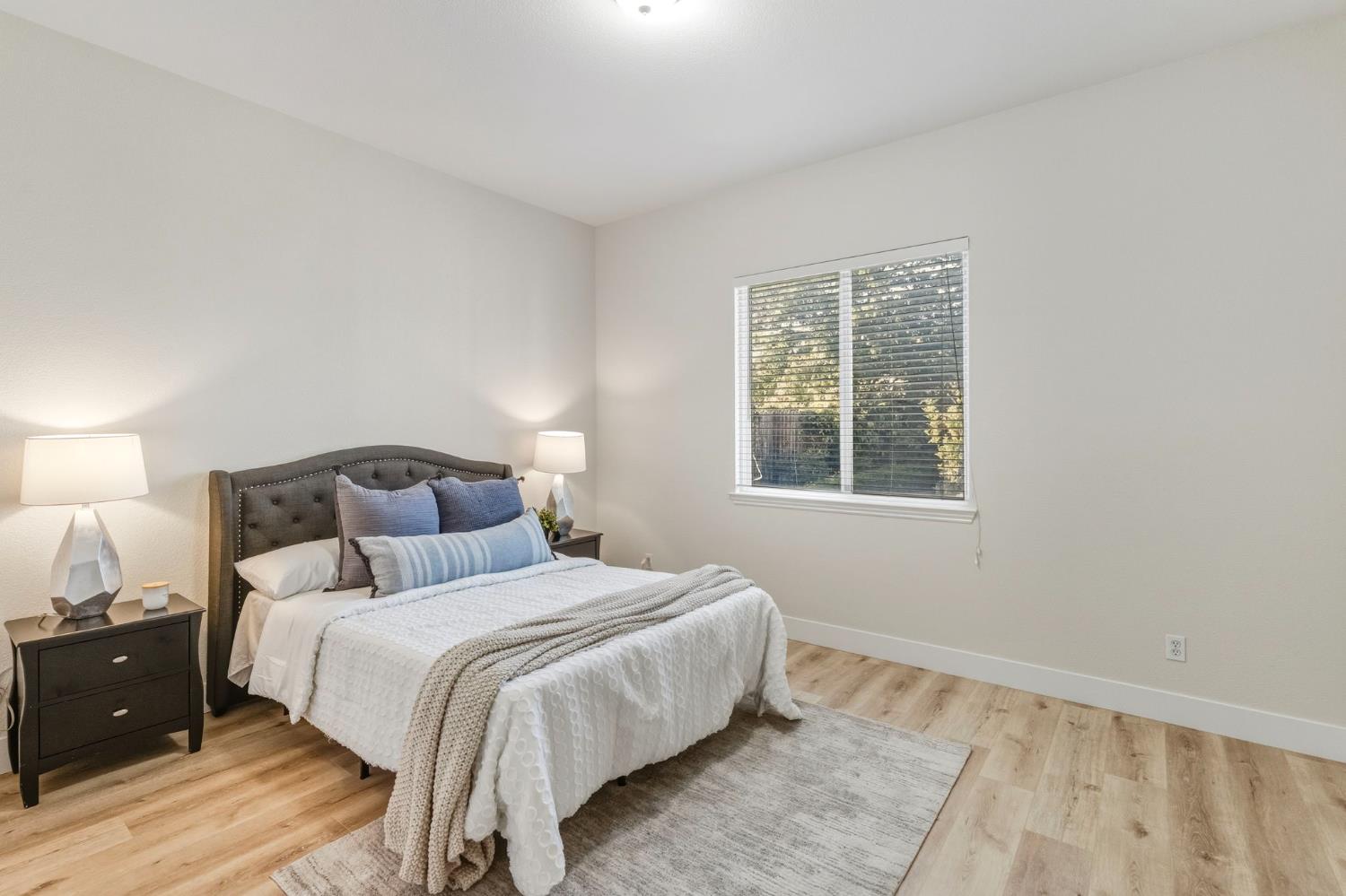 3412 Muscat Way Rancho Cordova, CA 95670 - Photo 25 of 33 a bedroom with a bed and a window