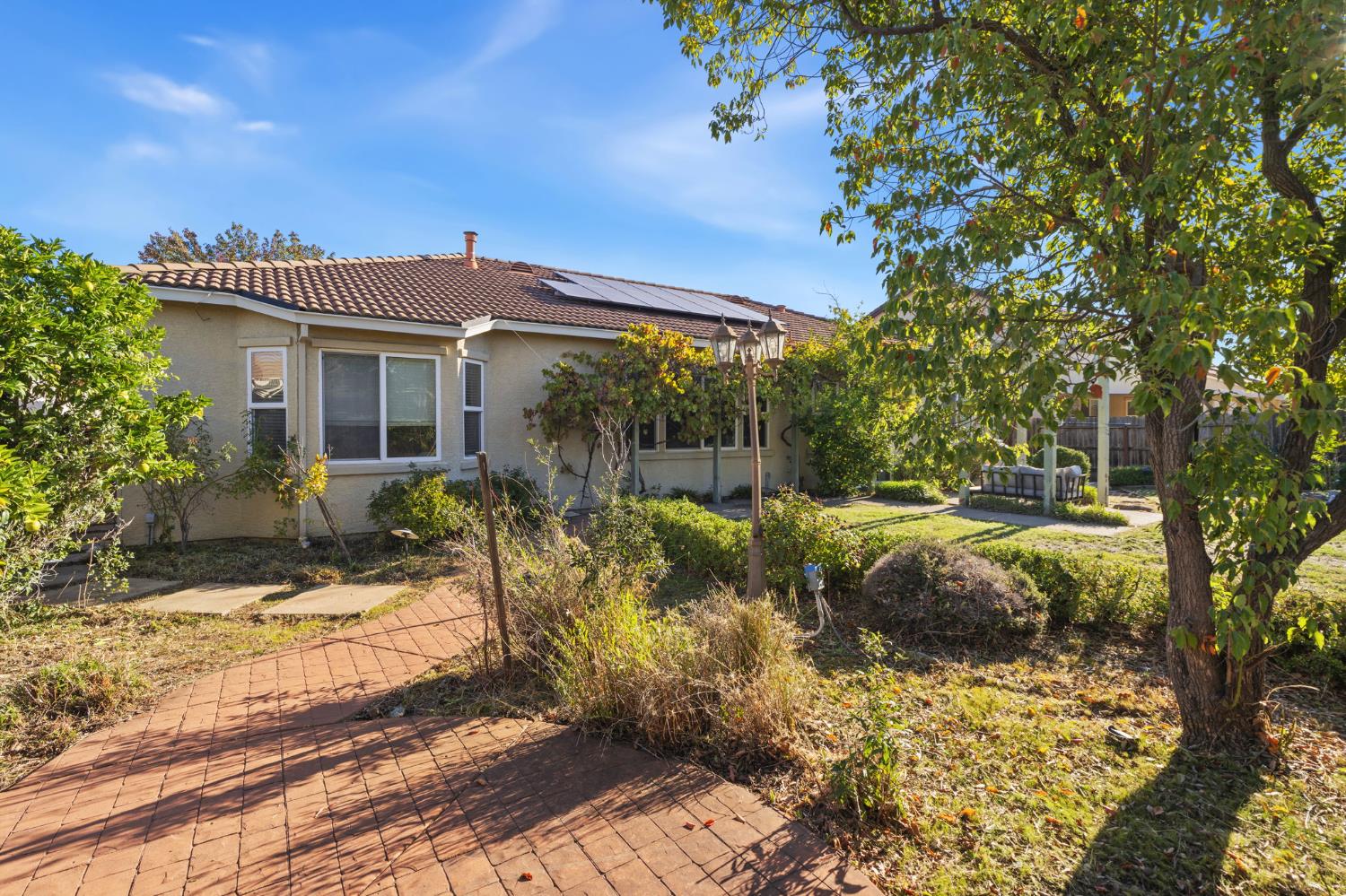 3412 Muscat Way Rancho Cordova, CA 95670 - Photo 32 of 33 a view of a house with a yard
