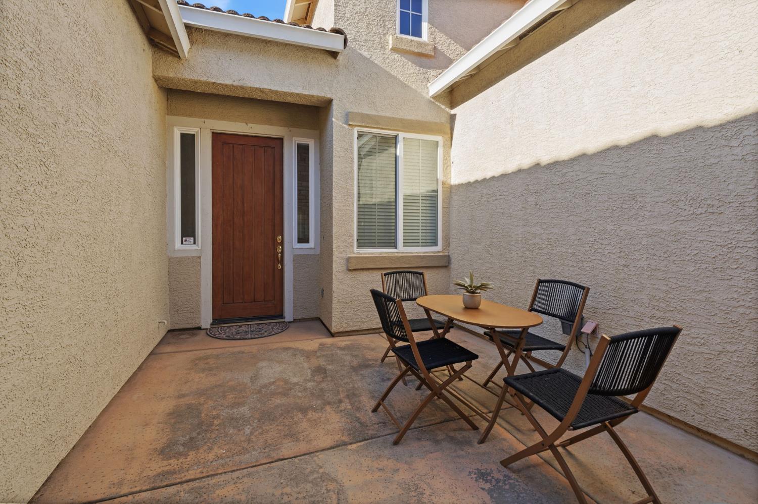 3412 Muscat Way Rancho Cordova, CA 95670 - Photo 4 of 33 a view of a outdoor seating area with furniture