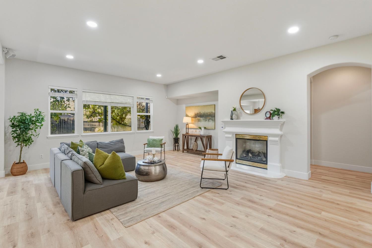 3412 Muscat Way Rancho Cordova, CA 95670 - Photo 6 of 33 a living room with furniture and a fireplace
