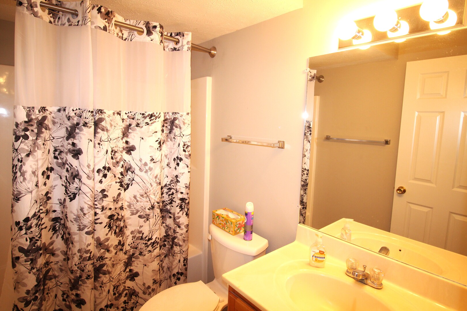 25 Oak Park Road Bloomington, IL 61701 - Photo 21 of 28 a bathroom with a sink toilet and shower