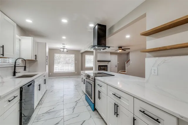 a view of kitchen and windows