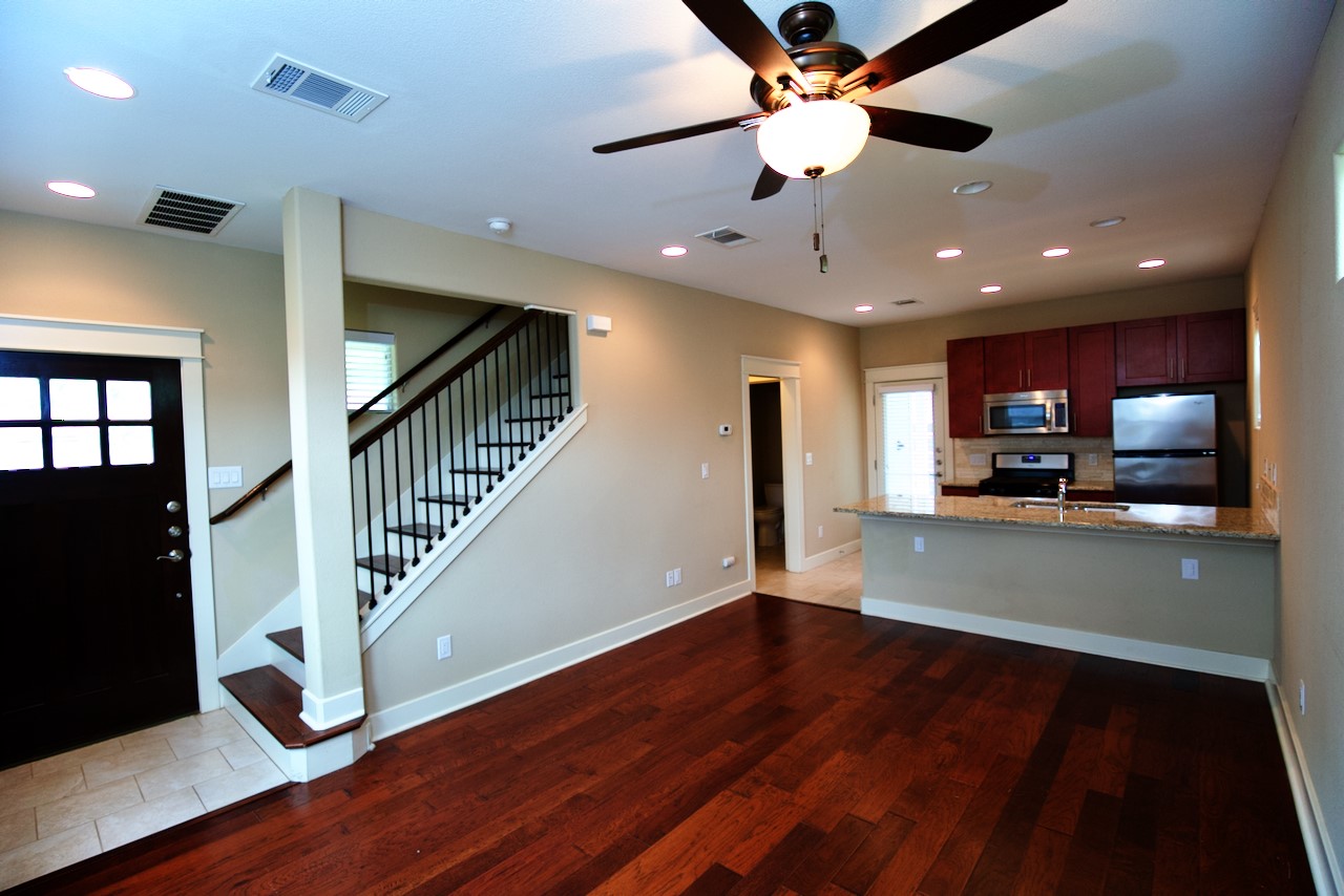 1800 Richcreek Road, Unit B Austin, TX 78757 - Photo 3 of 10 a view of a kitchen with a stove and cabinets