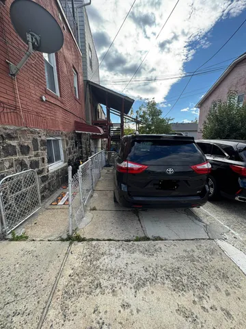a car parked in front of a building