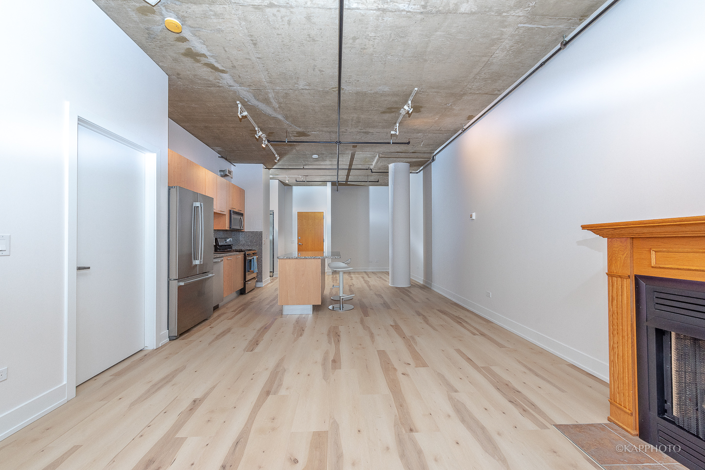 111 South Morgan Street, Unit 619 Chicago, IL 60607 - Photo 11 of 35 a view of entryway with stairs and a chandelier