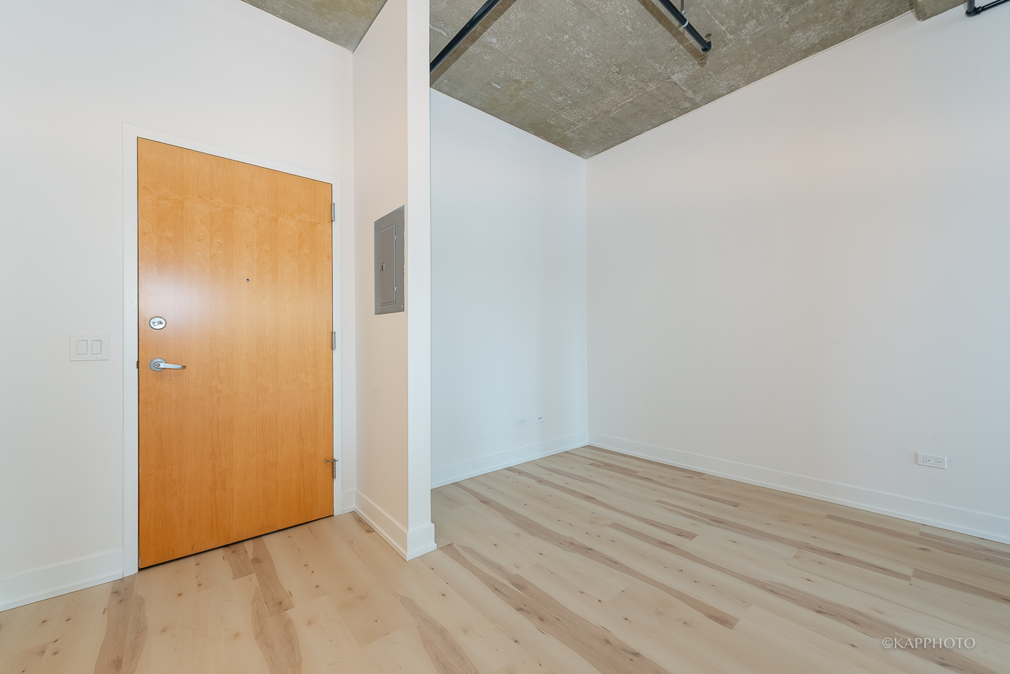 111 South Morgan Street, Unit 619 Chicago, IL 60607 - Photo 22 of 35 a view of a small space with wooden floor and a window