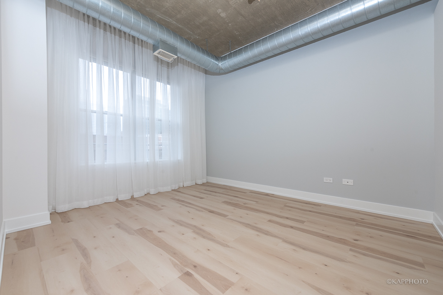 111 South Morgan Street, Unit 619 Chicago, IL 60607 - Photo 23 of 35 a view of an empty room and window