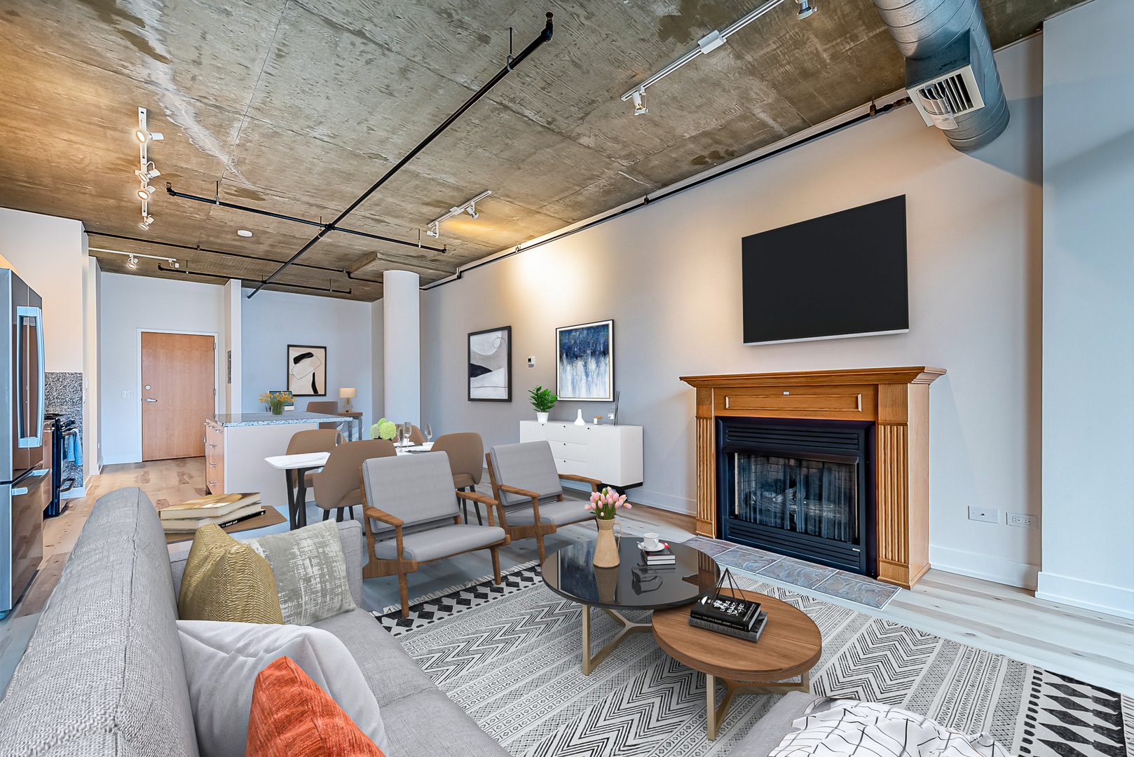 111 South Morgan Street, Unit 619 Chicago, IL 60607 - Photo 4 of 35 a living room with furniture and a fireplace
