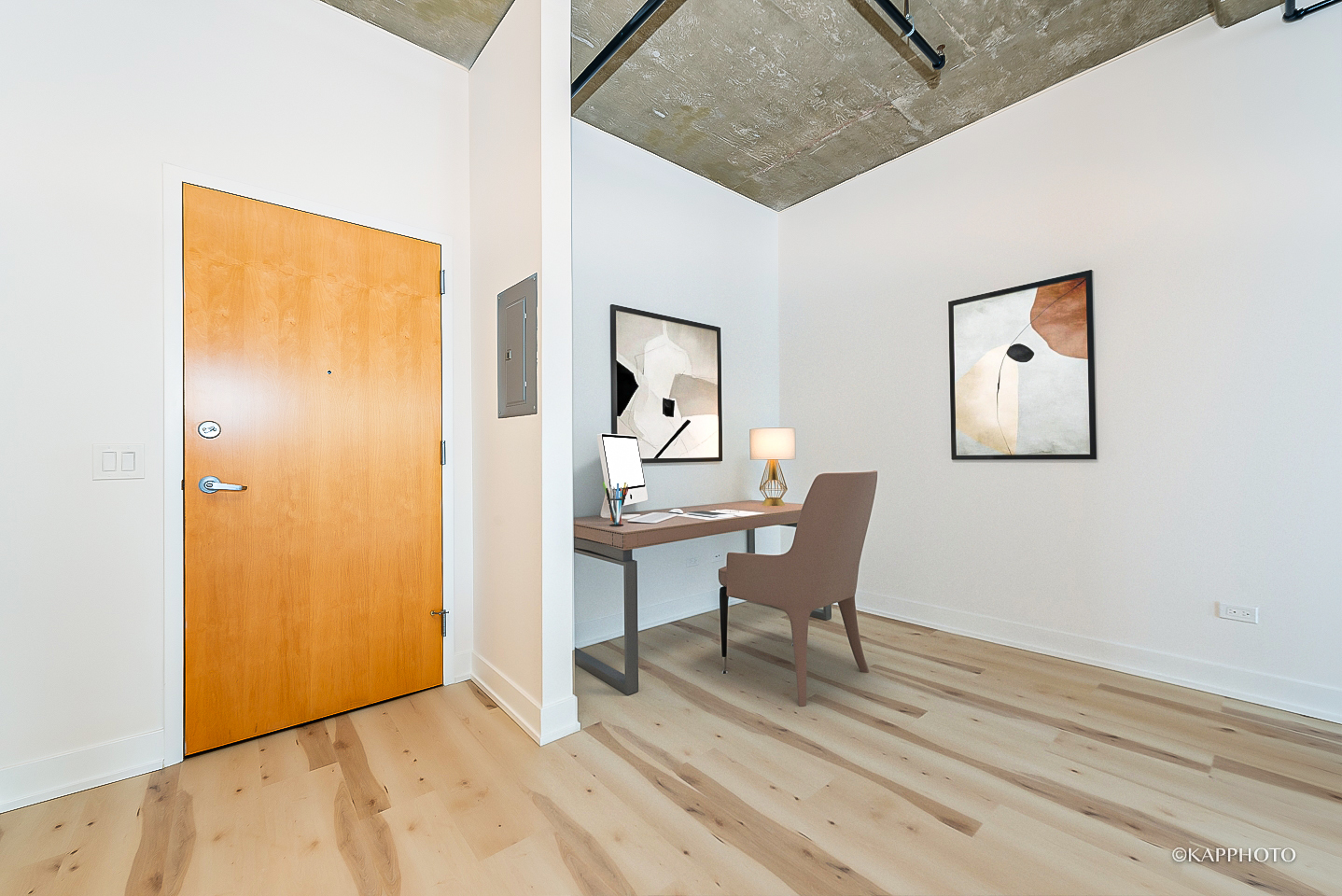 111 South Morgan Street, Unit 619 Chicago, IL 60607 - Photo 7 of 35 a workspace with wooden floor and a cabinet