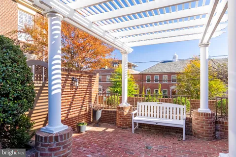 a view of a porch with a bench