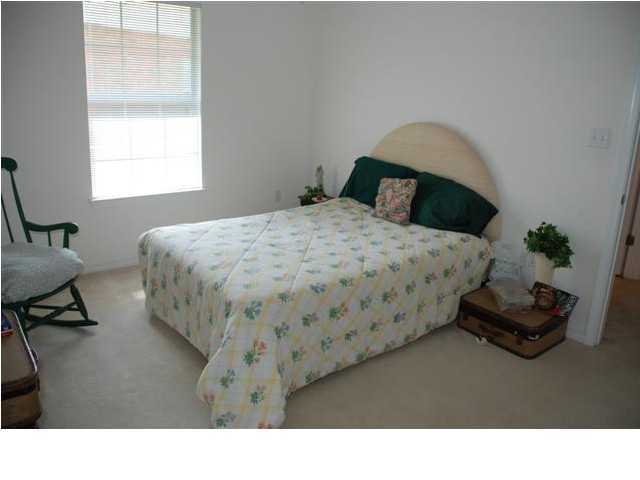 3900 Mesa Road Destin, FL 32541 - Photo 11 of 12 a bedroom with a bed and a window