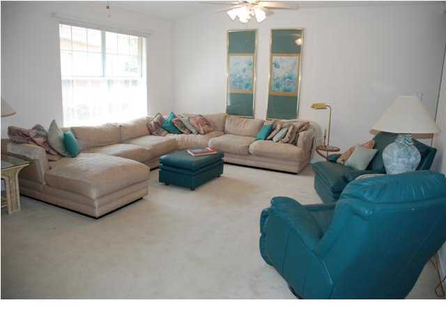 3900 Mesa Road Destin, FL 32541 - Photo 3 of 12 a living room with furniture and a large window