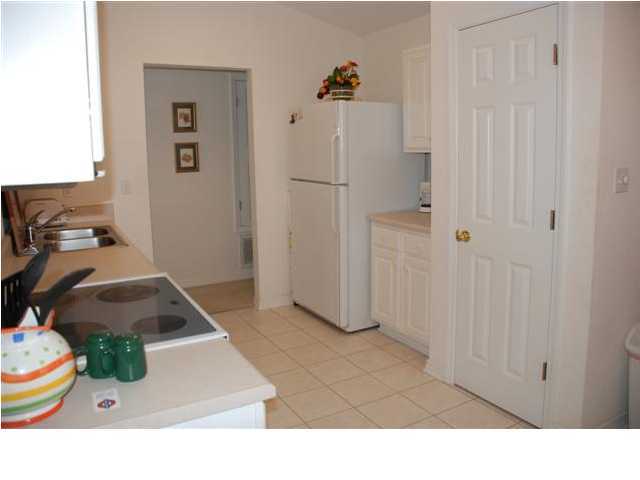 3900 Mesa Road Destin, FL 32541 - Photo 5 of 12 a bathroom with a sink toilet and shower