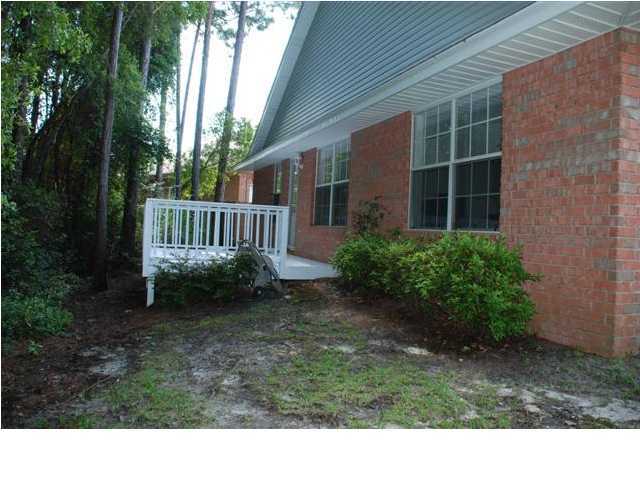 3900 Mesa Road Destin, FL 32541 - Photo 7 of 12 a view of backyard with green space